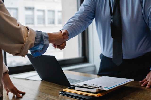 We will help you - Photo by Sora Shimazaki: https://www.pexels.com/photo/crop-colleagues-shaking-hands-in-office-5673488/